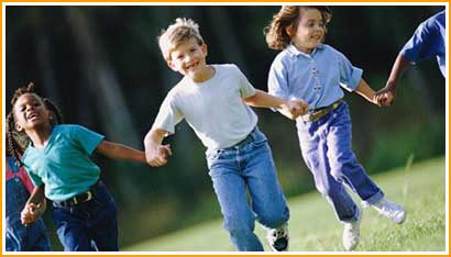 Children running holding hands