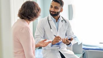 Doctor and patient talking in office