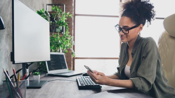 Woman sitting at computer
